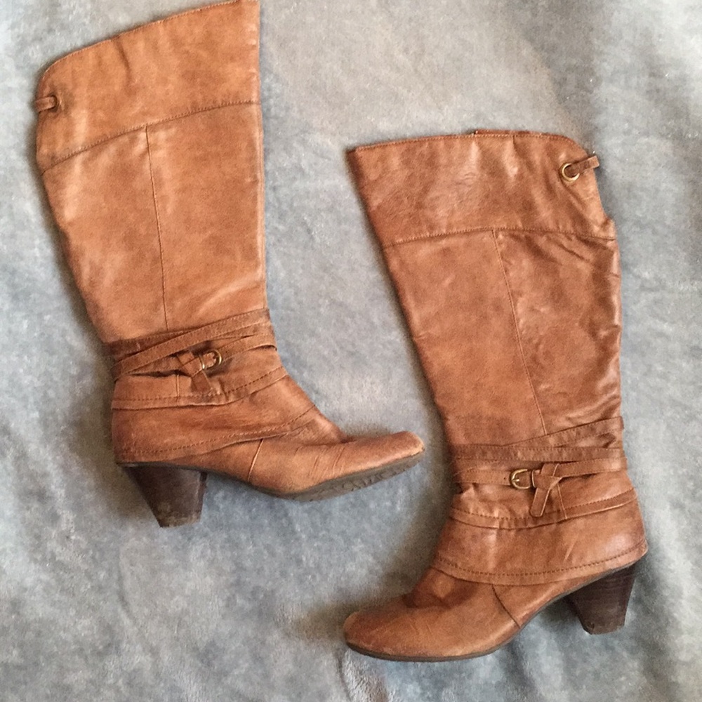 Tall, heeled, leather boots